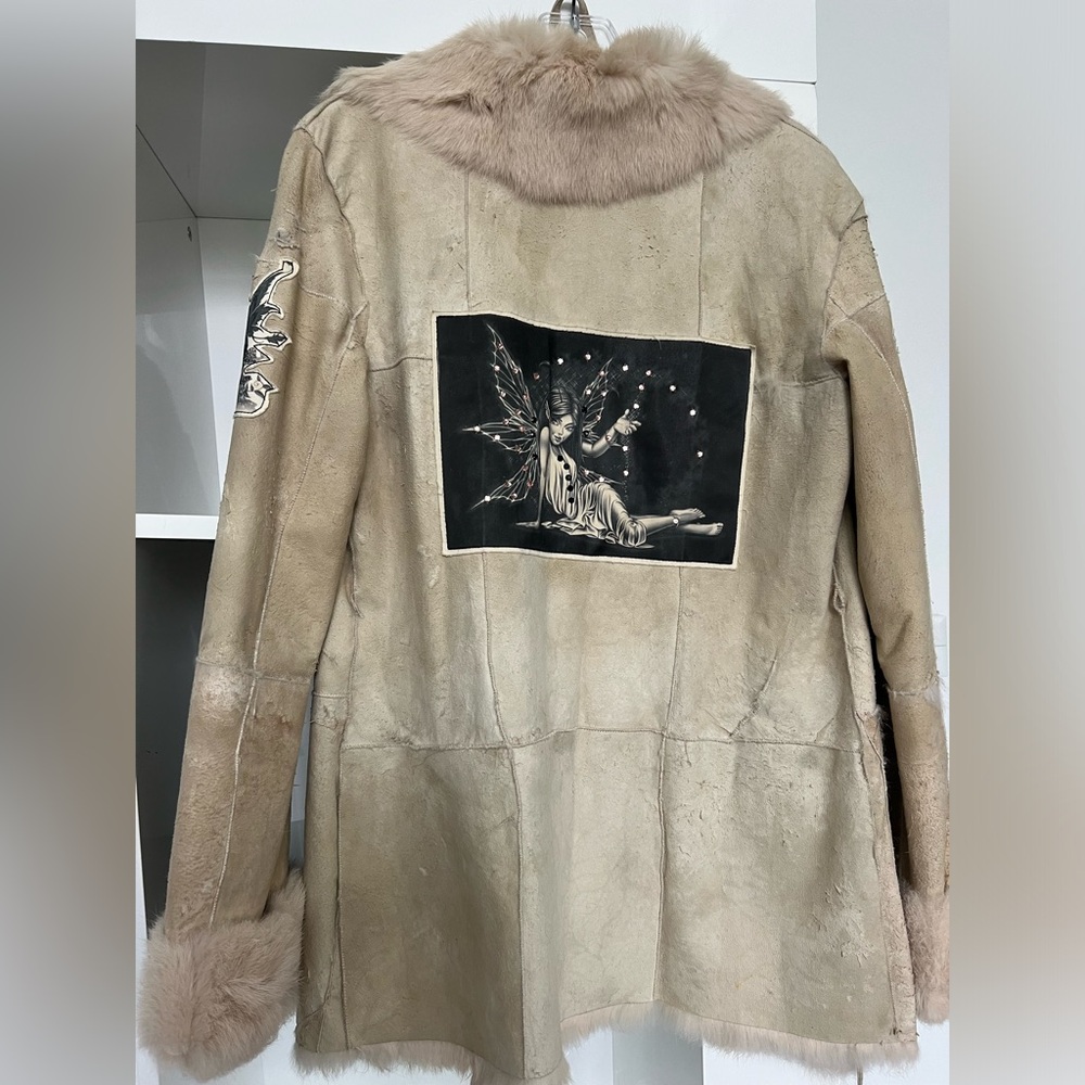 A fair jacket, real fair beige color color size small very warm
